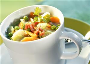 Mixed vegetable soup served in a cup