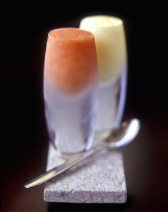 Orange sorbet and lemon sorbet in glasses