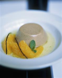 Chocolate panna cotta with orange sauce