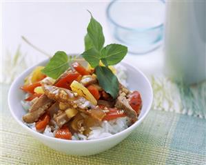 Duck with pineapple, peppers and rice in bowl (4)