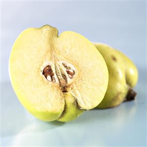 Half a quince in front of a whole quince