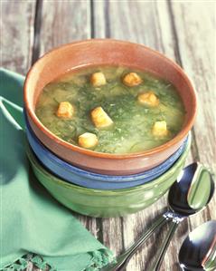 Cucumber soup with bread cubes