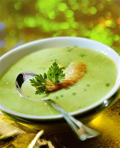 Courgette soup with fried shrimp tail