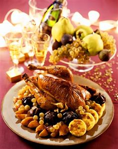 Roast capon with fruit and polenta cakes