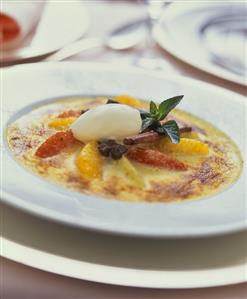 Citrus fruit brulee with ice cream