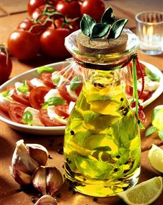 Basil and lime oil, tomatoes with mozzarella behind