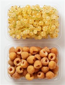 Yellow raspberries and white currants