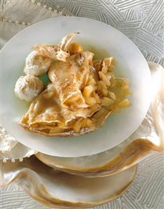 Crepes with apple filling and cider sauce