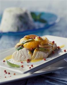 Gratin of cod fillet with mandarins and mushrooms