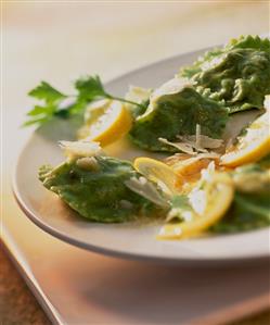 Green ravioli with lemon and mince filling