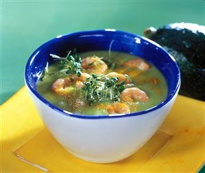 Warm avocado soup with shrimps