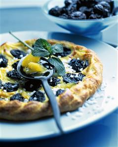 Small puff pastry tart with pineapple and prunes