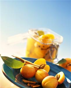 Fresh and bottled apricots with cinnamon and cloves