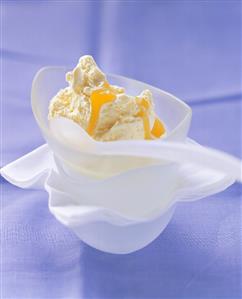 Mango and mascarpone ice cream in bowl