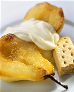 Caramelised pear with cream and biscuit