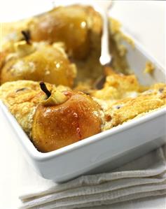 Sweet pudding with stuffed apples