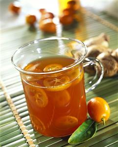 Tea punch with kumquats