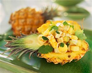 Spicy stuffed baby pineapple with smoked tofu, spring onions