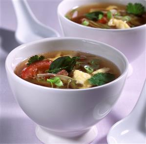 Asian tomato soup with egg and lime leaves