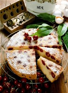 A cherry cake, pieces cut