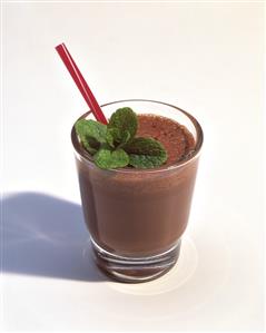 Chocolate Shake with Mint Leaves and a Red Straw