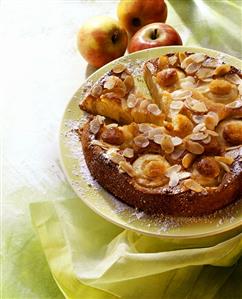 A baked apple cake and apples (1)