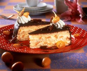 Cream gateau with kumquats and chocolate icing