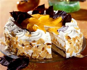 Sharon fruit cream gateau with chocolate leaves