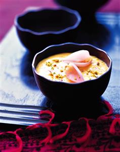 Mango mousse with chopped pistachios & rose petals