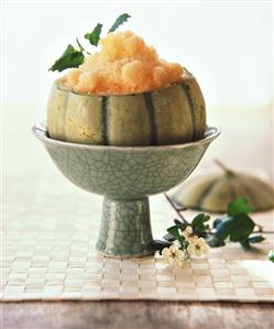 Melon ice cream in hollowed-out Charentais melon