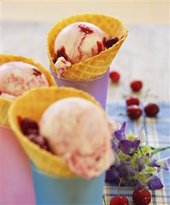 Cherry ice cream in ice cream cones