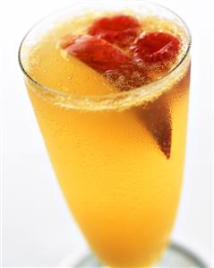 A glass of peach fizz