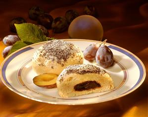 Yeast dumpling with plum puree and poppy seeds