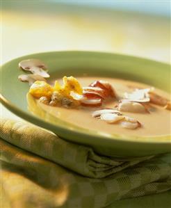 Lobster soup with deep-fried nasturtium flowers