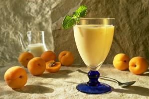 A glass of apricot buttermilk shake