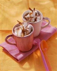 Wintry spiced chocolate milk with cream and coconut curls