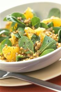 Corn salad with fruit and fried buckwheat