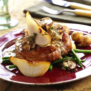 Pork fillet with mushroom & cream sauce and pear wedges