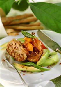 Pork fillet with avocado and peach chutney