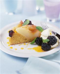 A piece of pear and blackberry cake