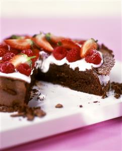 Chocolate cake with raspberries and strawberries