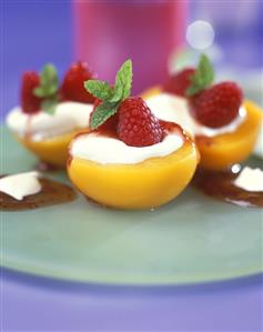 Poached peaches with raspberry cream