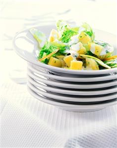 Potato and apple salad with celery and sour cream