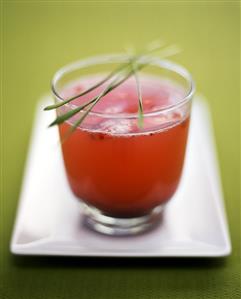 Grapefruit and cranberry drink with wheat grass