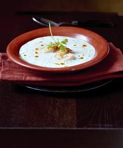 Potato and coconut soup with shrimps