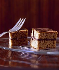 Delicate chocolate squares in marzipan & sponge mixture