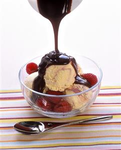 Vanilla & raspberry icecream with raspberries & chocolate sauce