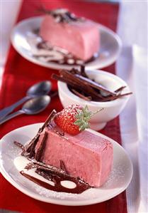 Strawberry parfait on chocolate cream sauce