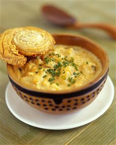 Parsnip and swede soup with almonds, pastry snail