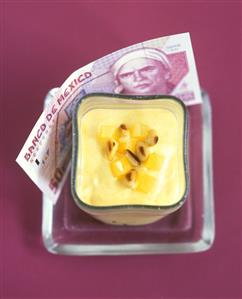 Mexican mango mousse with pineapple and almonds